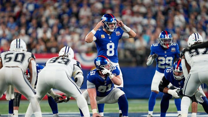 Sep 26, 2024; East Rutherford, NJ, US; New York Giants quarterback Daniel Jones (8) calls a play from behind New York Giants center John Michael Schmitz Jr. (61) at MetLife Stadium. Mandatory Credit: Julian Guadalupe-NorthJersey.com