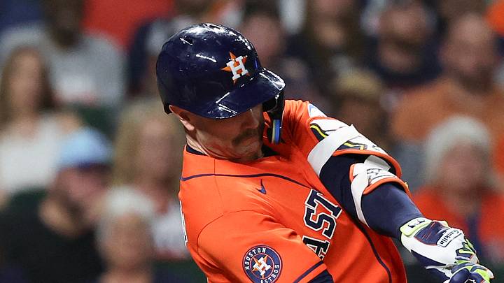 Aug 21, 2026; Houston, Texas, USA;  Houston Astros first baseman Christian Walker (8) hits a RBI sacrifice against the Athletics in the fourth inning at Daikin Park.  Mandatory Credit: Thomas Shea-Imagn Images