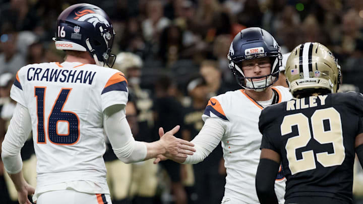 Aug 23, 2025; New Orleans, Louisiana, USA; Denver Broncos punter Jeremy Crawshaw (16), celebrates a field goal by place kicker Wil Lutz, center, against the New Orleans Saints during the first half at Caesars Superdome. Aug 23, 2025; New Orleans, Louisiana, USA; Denver Broncos punter Jeremy Crawshaw (16), celebrates a field goal by place kicker Wil Lutz, center, against the New Orleans Saints during the first half at Caesars Superdome.