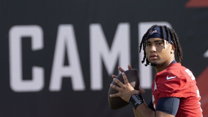 Jul 30, 2023; Houston, TX, USA; Houston Texans quarterback C.J. Stroud (7) throws during training camp practice at the Houston Methodist Training Center. Mandatory Credit: Thomas Shea-USA TODAY Sports Jul 30, 2023; Houston, TX, USA; Houston Texans quarterback C.J. Stroud (7) throws during training camp practice at the Houston Methodist Training Center. Mandatory Credit: Thomas Shea-USA TODAY Sports