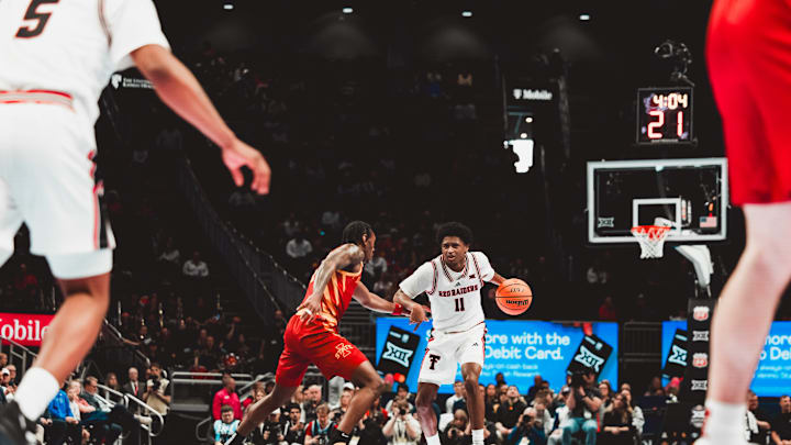 (11) freshman guard Jaylen Petty drives the ball up the court vs Iowa State. At the Phillips 66 Big 12 Conference Tournament at the T-Mobile Center in Kansas City, Missouri