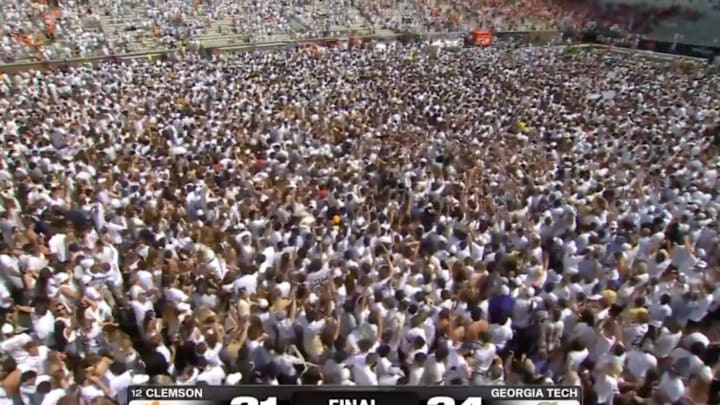 Georgia Tech fans stormed the field after their dramatic last-second win over Clemson. Georgia Tech fans stormed the field after their dramatic last-second win over Clemson.