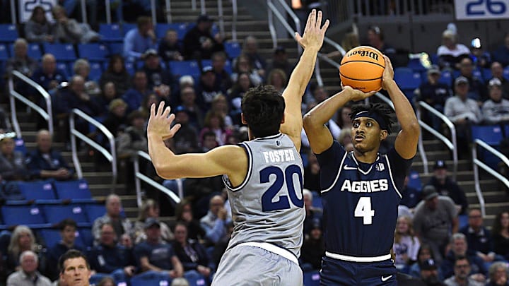 Utah State’s Ian Martinez shoots while taking on Nevada at Lawlor Events Center in Reno on Dec. 31, 2024.