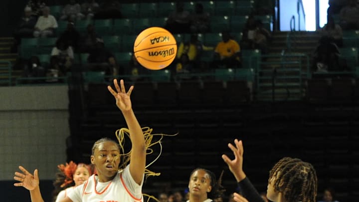 Andrew Jackson center Tamia Watkins throws a pass during the state playoffs against Lake City on Tuesday at the Florence Center.