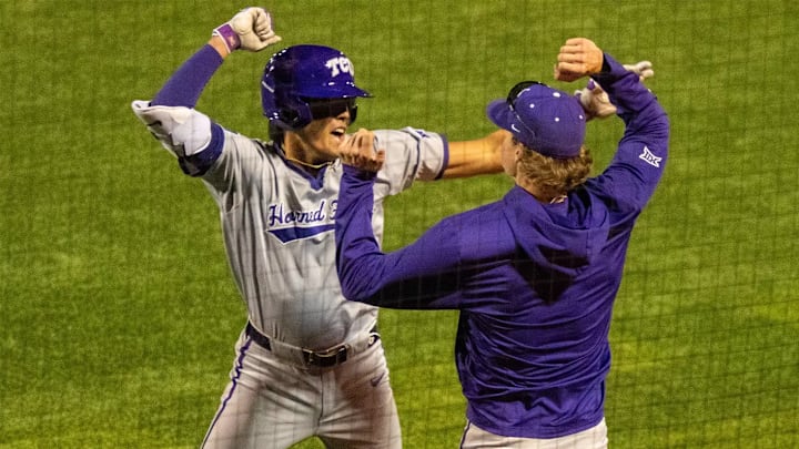 Jack Bell celebrates wit teammates after hammering his 3rd homerun of the year. 