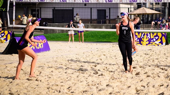TCU women's beach volleyball players Daniela Alverez and Hailey Hamlett celebrating. 
