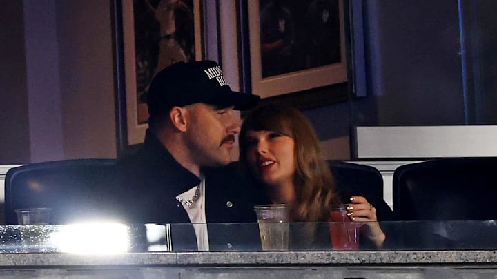 Oct 14, 2024; Bronx, New York, USA; Recording artist Taylor Swift and Kansas City Chiefs tight end Travis Kelce watch game one of the ALCS for the 2024 MLB Playoffs between the New York Yankees and the Cleveland Guardians at Yankee Stadium.