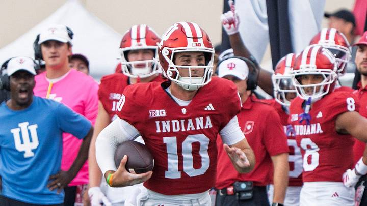 Indiana's Josh Hoover (10) runs during the Indiana versus Howard football game at Memorial Stadium on Saturday, Sept. 12, 2026. Indiana's Josh Hoover (10) runs during the Indiana versus Howard football game at Memorial Stadium on Saturday, Sept. 12, 2026.