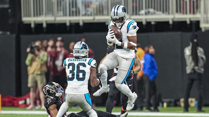 Jan 5, 2025; Atlanta, Georgia, USA; Carolina Panthers cornerback Michael Jackson (2) intercepts a deflected pass against the Atlanta Falcons during the second half at Mercedes-Benz Stadium. Jan 5, 2025; Atlanta, Georgia, USA; Carolina Panthers cornerback Michael Jackson (2) intercepts a deflected pass against the Atlanta Falcons during the second half at Mercedes-Benz Stadium.