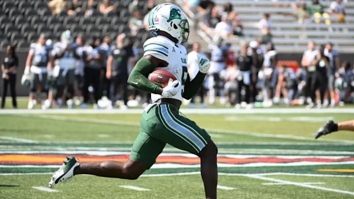 Tulane Green Wave's Rayshawn Pleasant running back a kickoff return for a touchdown vs. UAB Blazers in a 71-20 victory on October 5th, 2024.