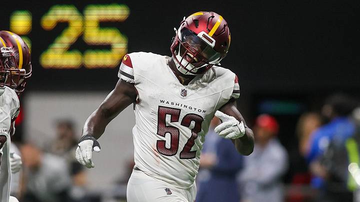 Oct 15, 2023; Atlanta, Georgia, USA; Washington Commanders linebacker Jamin Davis (52) reacts after an interception against the Atlanta Falcons in the second half at Mercedes-Benz Stadium. Mandatory Credit: Brett Davis-Imagn Images