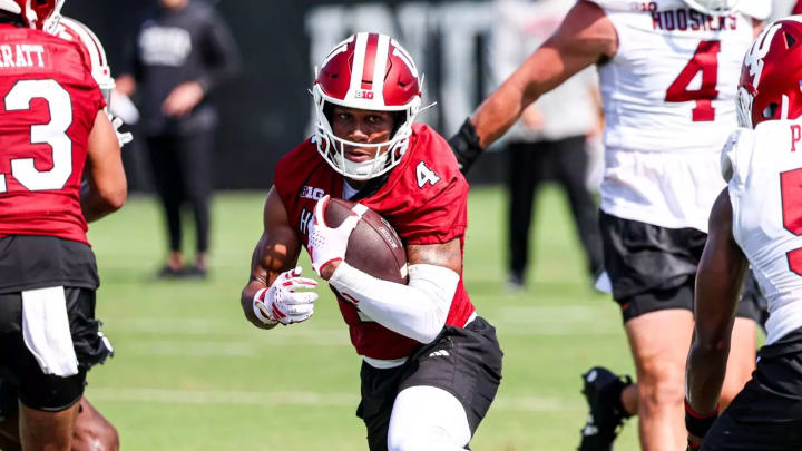 Indiana wide receiver Myles Price runs with the ball during fall camp. Indiana wide receiver Myles Price runs with the ball during fall camp.