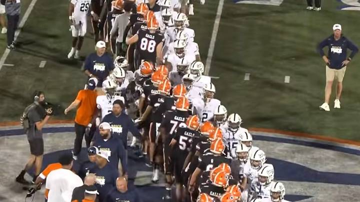 St. John Bosco (white) shakes hands with Bishop Gorman after a gallant second-half effort falls short during a 38-28 loss Aug 21 in Las Vegas. St. John Bosco (white) shakes hands with Bishop Gorman after a gallant second-half effort falls short during a 38-28 loss Aug 21 in Las Vegas.