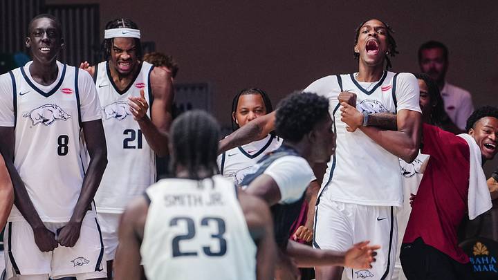The Razorback bench celebrates during Arkansas' 91-49 win over Toros Del Valle in Nassau, Bahamas, on Monday, Aug. 3, 2026. The Razorback bench celebrates during Arkansas' 91-49 win over Toros Del Valle in Nassau, Bahamas, on Monday, Aug. 3, 2026.