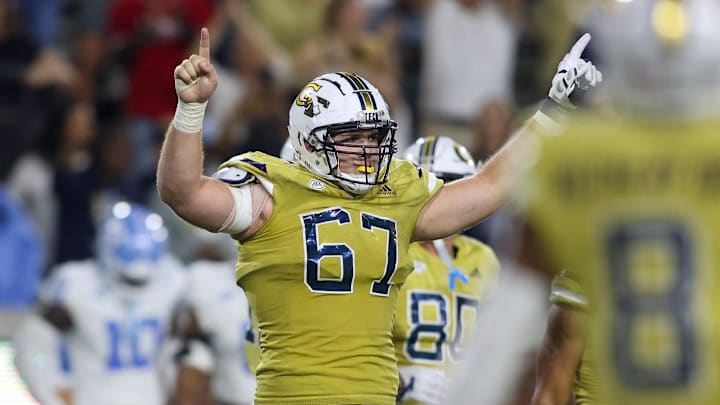 Oct 28, 2023; Atlanta, Georgia, USA; Georgia Tech Yellow Jackets offensive lineman Joe Fusile (67) reacts after a touchdown against the North Carolina Tar Heels in the second half at Bobby Dodd Stadium at Hyundai Field. Mandatory Credit: Brett Davis-Imagn Images Oct 28, 2023; Atlanta, Georgia, USA; Georgia Tech Yellow Jackets offensive lineman Joe Fusile (67) reacts after a touchdown against the North Carolina Tar Heels in the second half at Bobby Dodd Stadium at Hyundai Field. Mandatory Credit: Brett Davis-Imagn Images