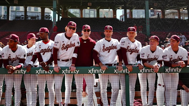 BC players stand in the dugout before a game at Fenway Park on April 11, 2026.