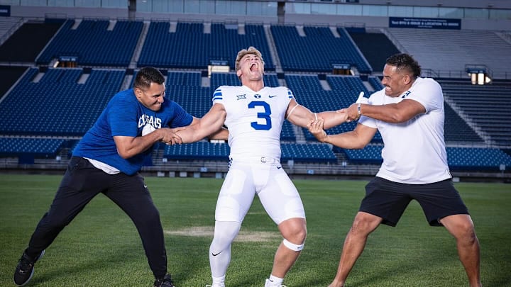 BYU commit McKay Madsen with BYU running backs coach Harvey Unga and BYU linebackers coach Justin Ena BYU commit McKay Madsen with BYU running backs coach Harvey Unga and BYU linebackers coach Justin Ena
