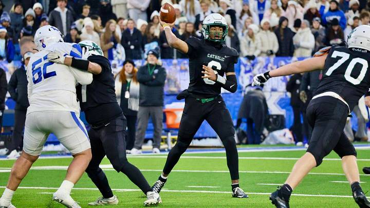 Owensboro Catholic and Louisville commit quarterback Dre'Mail Carothers showed out last Friday, going 24-for-25 with six TDs and one rushing score. Owensboro Catholic and Louisville commit quarterback Dre'Mail Carothers showed out last Friday, going 24-for-25 with six TDs and one rushing score.