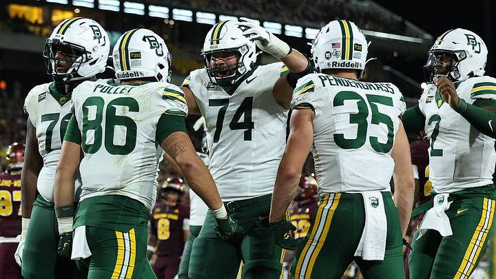 Baylor tight end Hawkins Polley (86) celebrates with Baylor Bears offensive lineman Kaden Sieracki (74) after scoring a third-quarter touchdown against the Arizona State Sun Devils. Baylor tight end Hawkins Polley (86) celebrates with Baylor Bears offensive lineman Kaden Sieracki (74) after scoring a third-quarter touchdown against the Arizona State Sun Devils.