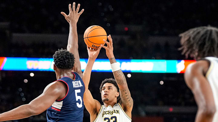 Michigan’s Yaxel Lendeborg shoots against UConn’s Tarris Reed Jr. during the 2026 men’s basketball national championship game.