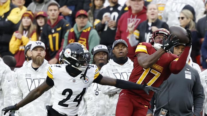 Nov 10, 2024; Landover, Maryland, USA; Washington Commanders wide receiver Terry McLaurin (17) catches a pass as Pittsburgh Steelers cornerback Joey Porter Jr. (24) defends during the second half at Northwest Stadium. Mandatory Credit: Geoff Burke-Imagn Images Nov 10, 2024; Landover, Maryland, USA; Washington Commanders wide receiver Terry McLaurin (17) catches a pass as Pittsburgh Steelers cornerback Joey Porter Jr. (24) defends during the second half at Northwest Stadium. Mandatory Credit: Geoff Burke-Imagn Images