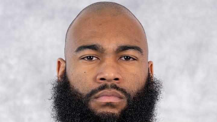 Gophers defensive line coach Winston DeLattiboudere III. 