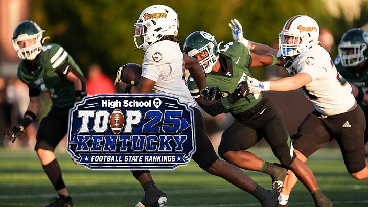Frederick Douglass High School's Dakari Talbert (6) tries to run against the Trinity defense during KHSAA Class 6A football Friday, August 29, 2025 at R.W. Marshall Stadium in Louisville, Kentucky. Frederick Douglass High School's Dakari Talbert (6) tries to run against the Trinity defense during KHSAA Class 6A football Friday, August 29, 2025 at R.W. Marshall Stadium in Louisville, Kentucky.