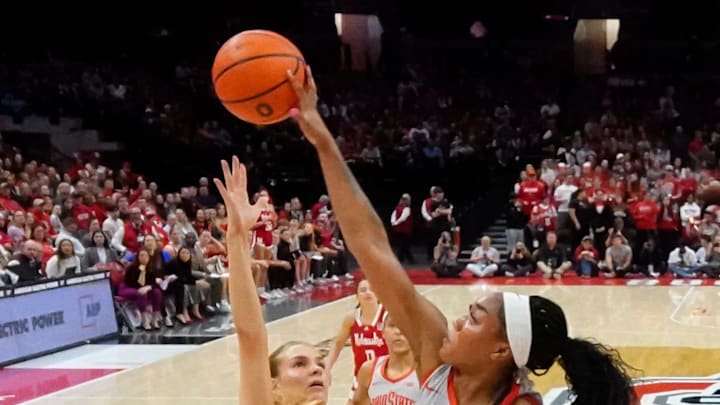 Feb 14, 2024; Columbus, Ohio, USA; Ohio State Buckeyes forward Cotie McMahon (32) blocks the shot of
