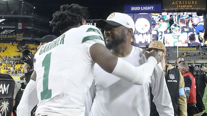 Oct 20, 2024; Pittsburgh, Pennsylvania, USA;  New York Jets cornerback Sauce Gardner (1) and Pittsburgh Steelers head coach Mike Tomlin (right ) greet each other after their game at Acrisure Stadium. Mandatory Credit: Charles LeClaire-Imagn Images