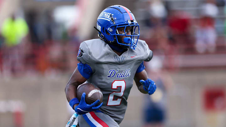 Duncanville receiver Ayson Theus runs against St. Frances Academy at Duncanville ISD Stadium.