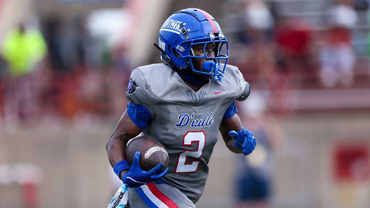 Duncanville's Ayson Theus carries the ball against St. Frances Academy in a national high school football tilt on Sept. 14, 2024. Duncanville's Ayson Theus carries the ball against St. Frances Academy in a national high school football tilt on Sept. 14, 2024.