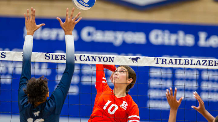 Redondo Union sophomore Sienna Castillo goes up for kill against the block of Sierra Canyon senior Brandi Boston in Sept. 10 match won by Redondo 25-19, 25-21, 25-21, 25-18 Redondo Union sophomore Sienna Castillo goes up for kill against the block of Sierra Canyon senior Brandi Boston in Sept. 10 match won by Redondo 25-19, 25-21, 25-21, 25-18