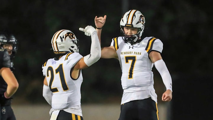 Newbury Park's Shane Rosenthal (left) and Brady Smigiel celebrate after a play.