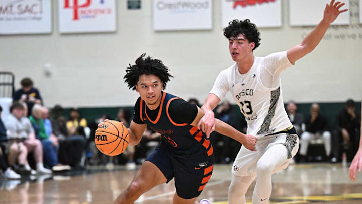 Roosevelt's Brayden Burries drives to the basket against St. John Bosco in the Classic at Damien Platinum Division final. Roosevelt's Brayden Burries drives to the basket against St. John Bosco in the Classic at Damien Platinum Division final.