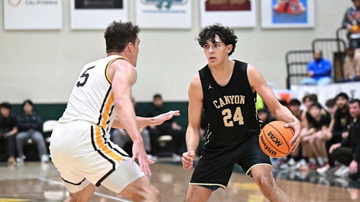 Brandon Benjamin of Anaheim Canyon with the ball.