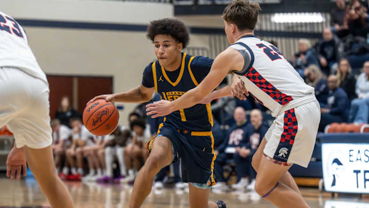 The Grand Ledge Comets against the East Lansing Trojans on Jan 24, 2025.