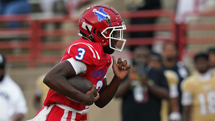 Maximus The Great Denson carries the ball for Duncanville in a game on Sept. 5 against South Oak Cliff. The No. 2-ranked Panthers lost in Week 4 to Waxahachie. 