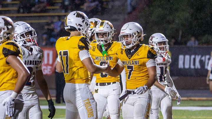 Mililani QB Hunter Fujikawa celebrates with RB Toa Sam after the Trojans took a late lead over Liberty on Aug. 14. The Trojans undefeated season finally came to an end in a lopsided 25-7 loss to Kapolei, knocking them out of the No. 1 position. Mililani QB Hunter Fujikawa celebrates with RB Toa Sam after the Trojans took a late lead over Liberty on Aug. 14. The Trojans undefeated season finally came to an end in a lopsided 25-7 loss to Kapolei, knocking them out of the No. 1 position.
