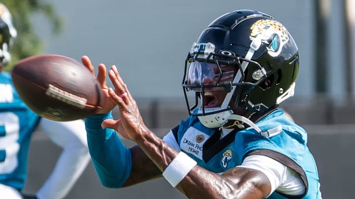 Jacksonville Jaguars wide receiver Travis Hunter (12) runs a passing drill during the Jacksonville Jaguars’ third mandatory minicamp Thursday June 12, 2025 at the Miller Electric Center in Jacksonville, Fla. 