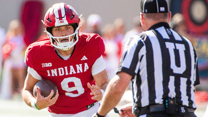Indiana quarterback Kurtis Rourke (9) runs against Nebraska at Memorial Stadium.