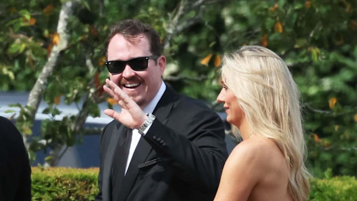 Comedian Shane Gillis waves to the spectators at the Olivia Culpo and Christian McCaffrey wedding at the Watch Hill Chapel and reception to follow at at the Ocean House in Westerly, RI on Saturday, June 29, 2024.