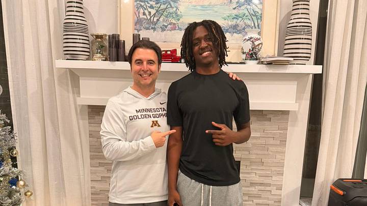Daniel Yebit with Gophers cornerbacks coach Nick Monroe.