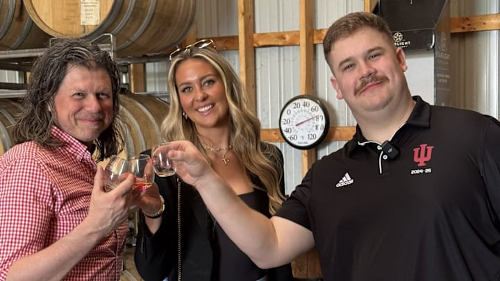 Indiana Media School Associate Dean Galen Clavio, former Indiana women's basketball player Sydney Parrish and former football player Mike Katic pose at Starlight Distillery on Friday. Indiana Media School Associate Dean Galen Clavio, former Indiana women's basketball player Sydney Parrish and former football player Mike Katic pose at Starlight Distillery on Friday.