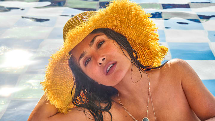 Salma Hayek Pinault was photographed by Ruven Afanador in Mexico. Hat by Alémais. 