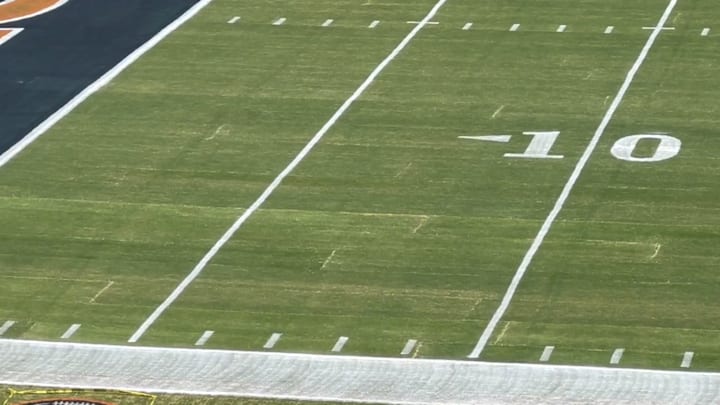 The seams on the surface at Soldier Field are visible from the radio booth ahead of the season opener Monday night. The seams on the surface at Soldier Field are visible from the radio booth ahead of the season opener Monday night.