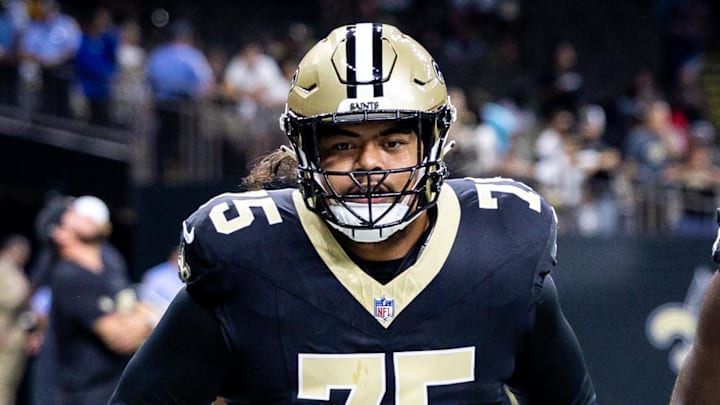 Aug 25, 2024; New Orleans, Louisiana, USA;  New Orleans Saints offensive tackle Taliese Fuaga (75) during the warmups before the game against the Tennessee Titans at Caesars Superdome. Mandatory Credit: Stephen Lew-Imagn Images