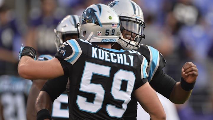 Aug 11, 2016; Baltimore, MD, USA; Carolina Panthers quarterback Cam Newton (1) and middle linebacker Luke Kuechly (59) talk before the game against the Baltimore Ravens at M&T Bank Stadium.