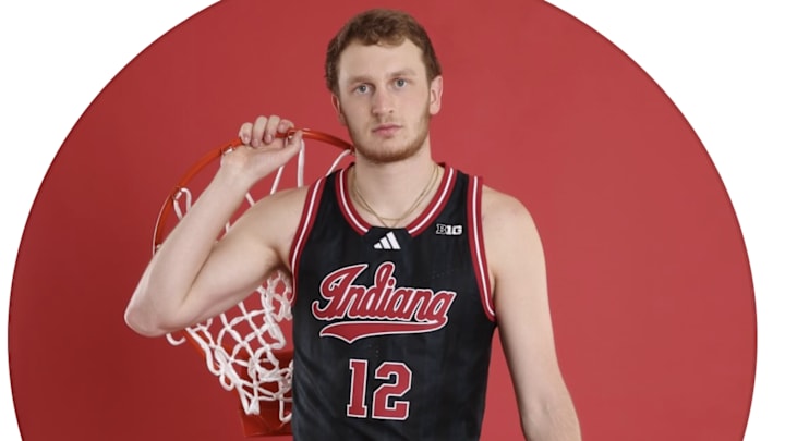 Tucker DeVries' Instagram avatar shows him in an Indiana uniform. The son of Indiana coach Darian DeVries has played for his father at both Drake and West Virginia.