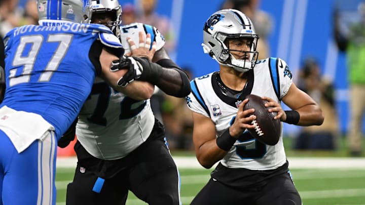 Oct 8, 2023; Detroit, Michigan, USA; Carolina Panthers quarterback Bryce Young (9) runs out of the pocket against the Detroit Lions in the first quarter at Ford Field. 