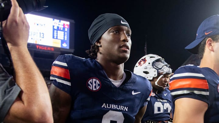 Auburn Tigers wide receiver Cam Coleman (8), defensive lineman Jay Hardy (92), quarterback Jackson Arnold (11), and kicker Alex McPherson (38) walk off the field together after the game as Auburn Tigers take on Ball State Cardinals at Jordan-Hare Stadium in Auburn, Ala. on Saturday, Sept. 6, 2025. Auburn Tigers defeated Ball State Cardinals 42-3. Auburn Tigers wide receiver Cam Coleman (8), defensive lineman Jay Hardy (92), quarterback Jackson Arnold (11), and kicker Alex McPherson (38) walk off the field together after the game as Auburn Tigers take on Ball State Cardinals at Jordan-Hare Stadium in Auburn, Ala. on Saturday, Sept. 6, 2025. Auburn Tigers defeated Ball State Cardinals 42-3.